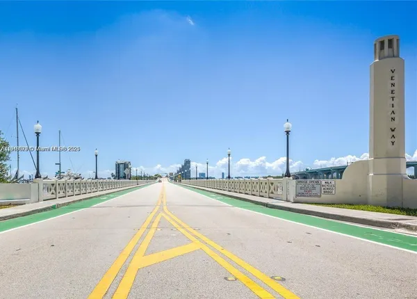 a front view of a building with glass windows