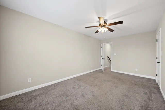 a view of a ceiling fan in a room