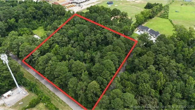 a view of a yard with a park