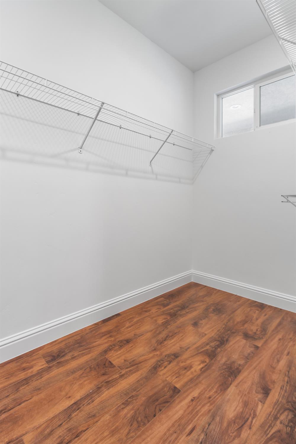 6404 Sylvan Road Citrus Heights, CA 95610 - Photo 14 of 20 a view of a room with racks on the wall
