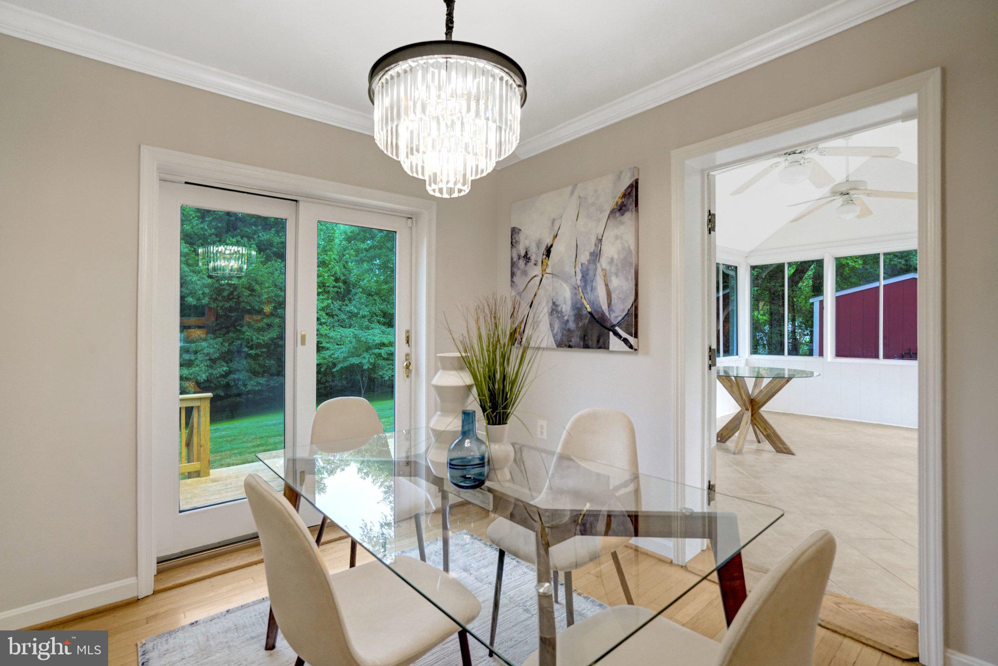 7107 Coventry Road Alexandria, VA 22306 - Photo 10 of 64 Dining space with sunroom access