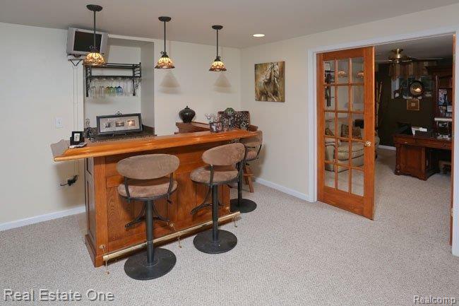 565 Timber Ridge Drive Highland, MI 48357 - Photo 36 of 55 Bar W/TV