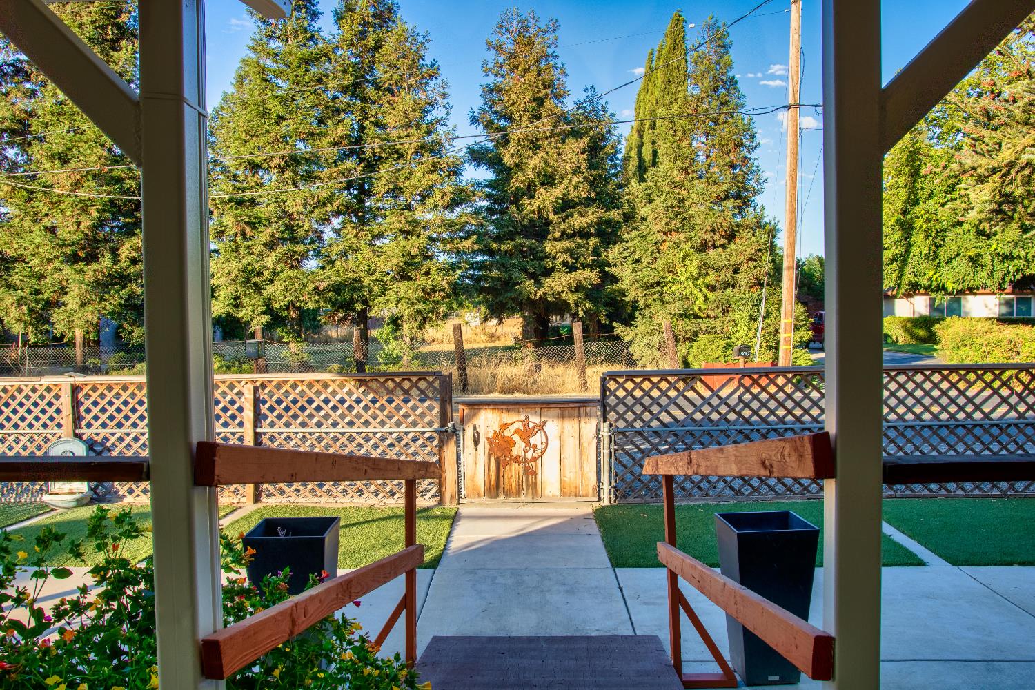1639 Alpine Road Stockton, CA 95215 - Photo 17 of 96 a balcony with wooden floor table and chairs