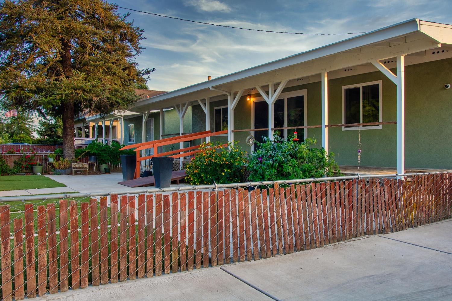 1639 Alpine Road Stockton, CA 95215 - Photo 18 of 96 a front view of a house with a garden