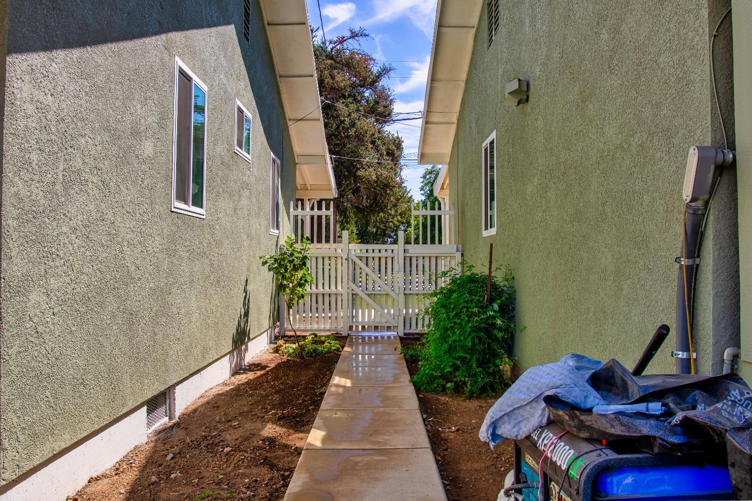 1639 Alpine Road Stockton, CA 95215 - Photo 38 of 96 a view of a porch with plants and entryway