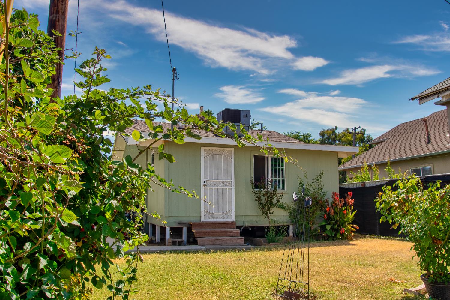 1639 Alpine Road Stockton, CA 95215 - Photo 44 of 96 a front view of a house with a yard