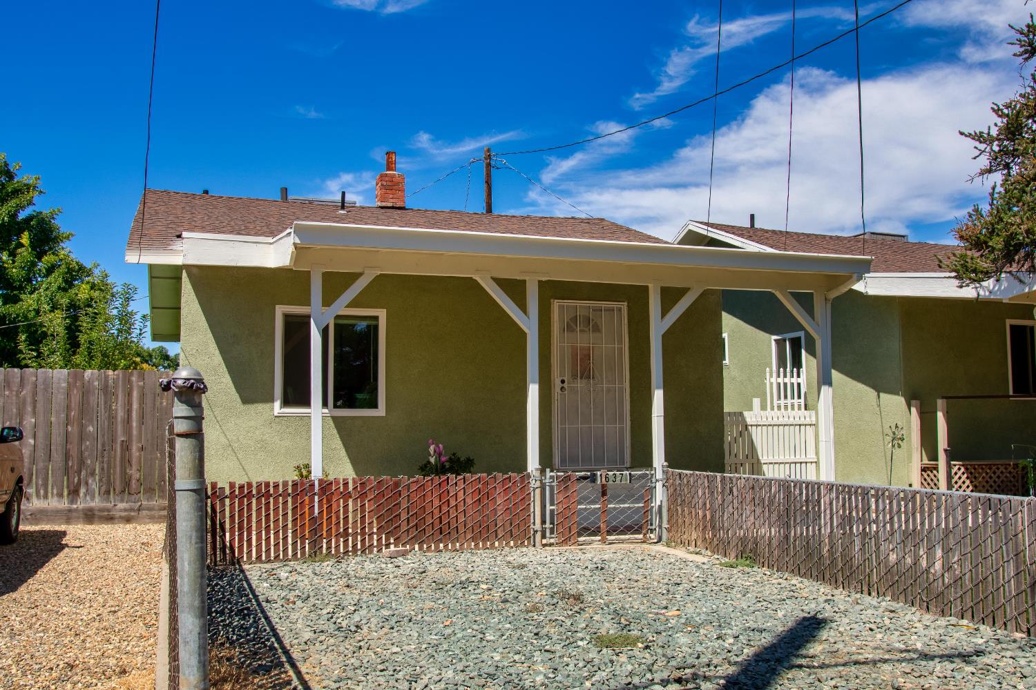 1639 Alpine Road Stockton, CA 95215 - Photo 49 of 96 a view of a house with a wooden fence
