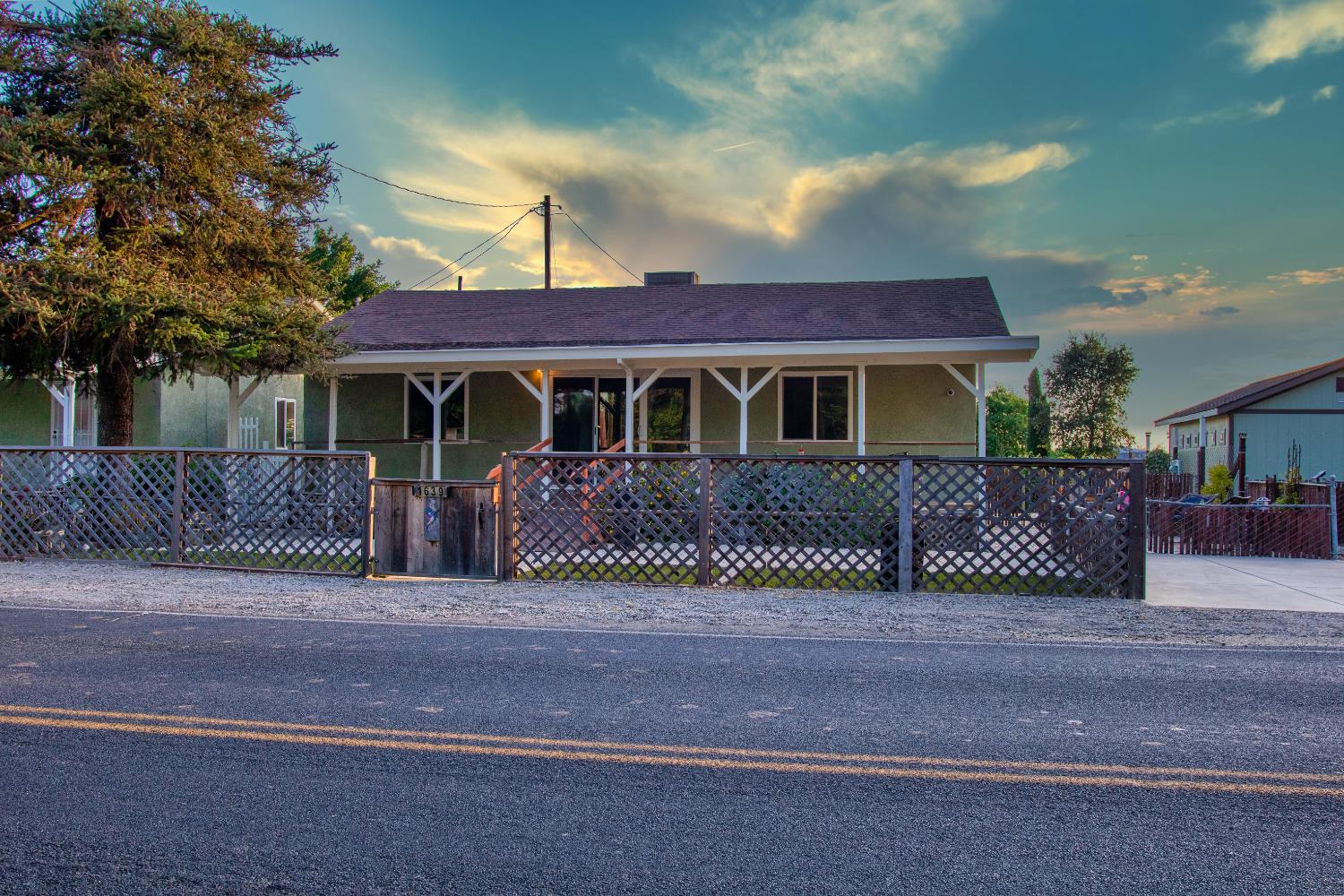 1639 Alpine Road Stockton, CA 95215 - Photo 5 of 96 a view of a house with a fence