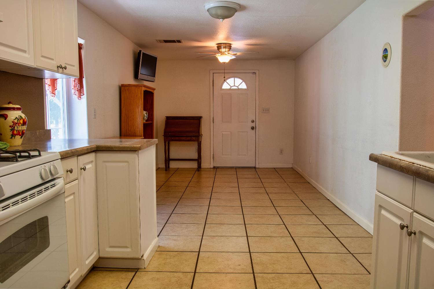 1639 Alpine Road Stockton, CA 95215 - Photo 55 of 96 a view of a kitchen with a sink and cabinets