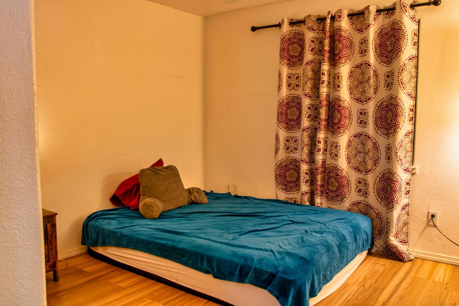 1639 Alpine Road Stockton, CA 95215 - Photo 59 of 96 a bedroom with a bed and a painting on the wall