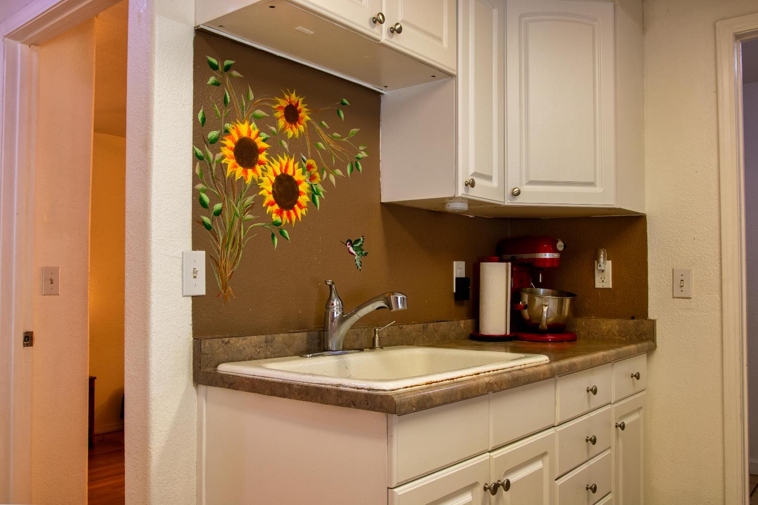 1639 Alpine Road Stockton, CA 95215 - Photo 62 of 96 a bathroom with a sink and a mirror