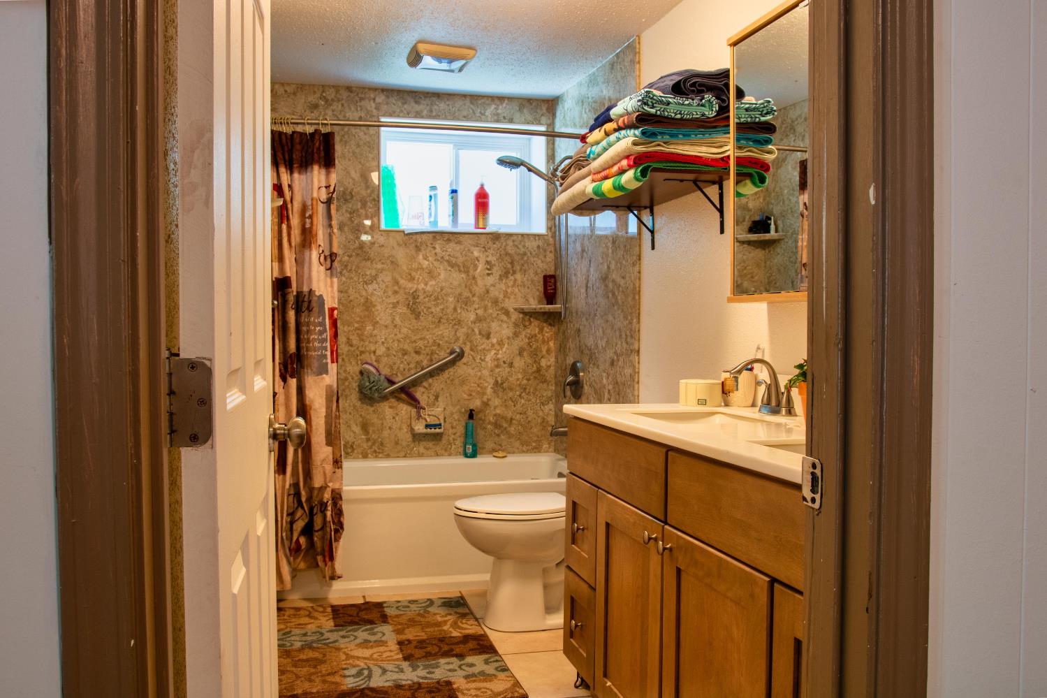 1639 Alpine Road Stockton, CA 95215 - Photo 73 of 96 a bathroom with a sink toilet and shower