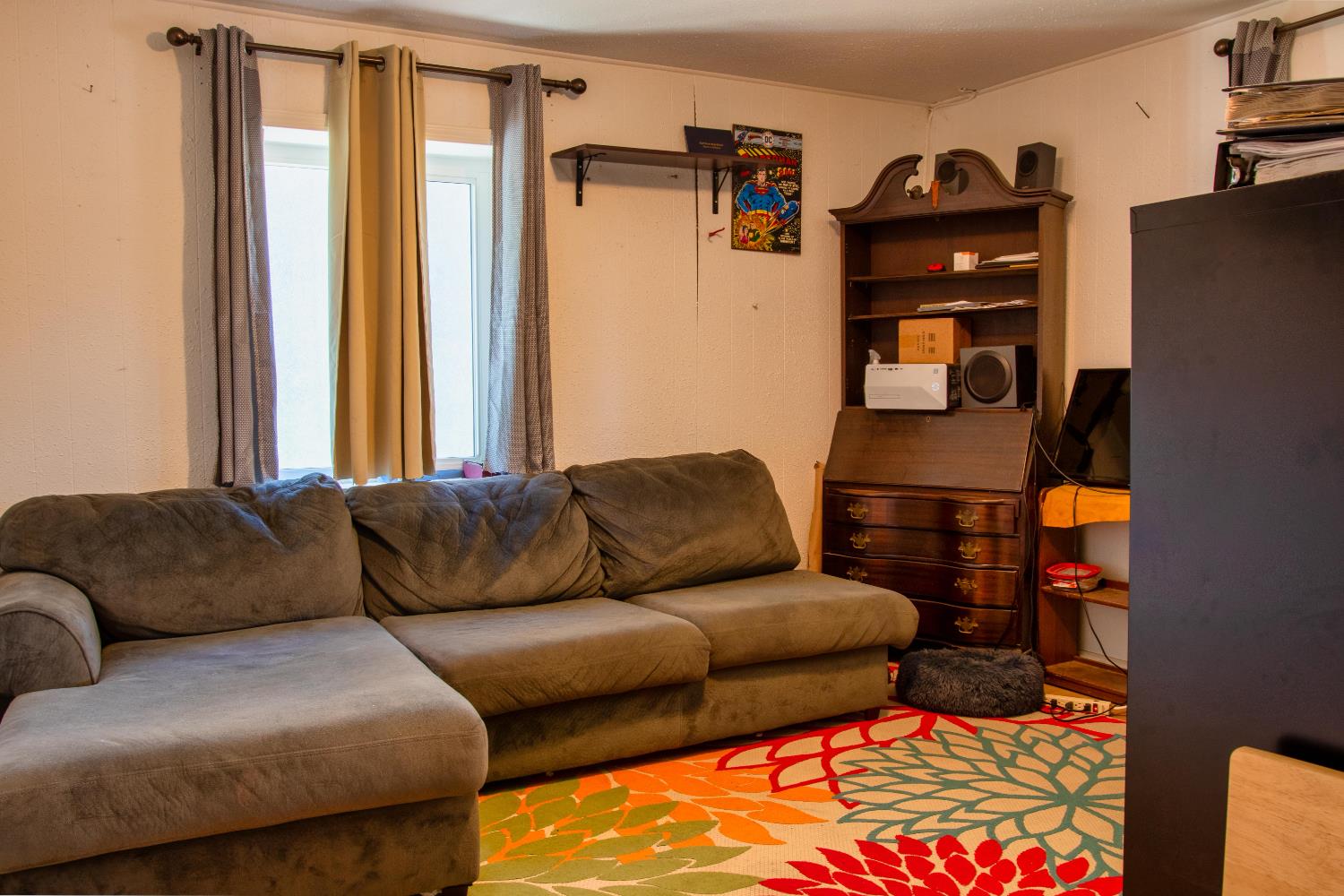 1639 Alpine Road Stockton, CA 95215 - Photo 75 of 96 a living room with furniture and a lamp