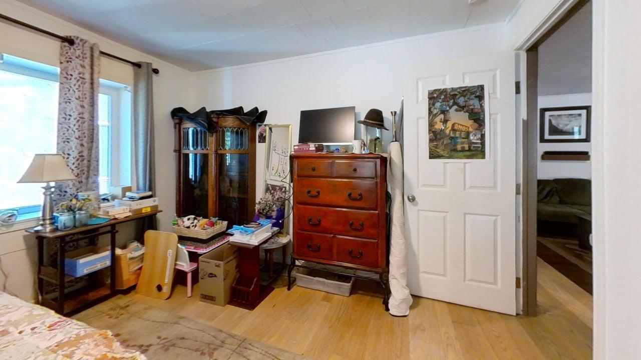 1639 Alpine Road Stockton, CA 95215 - Photo 79 of 96 a living room with furniture and a flat screen tv