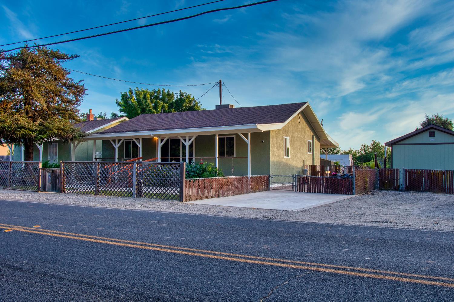 1639 Alpine Road Stockton, CA 95215 - Photo 8 of 96 a front view of a house with a garden and yard