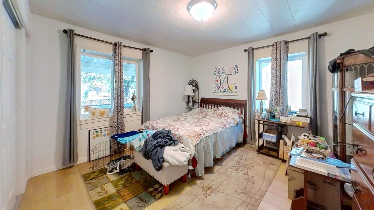 1639 Alpine Road Stockton, CA 95215 - Photo 81 of 96 a bed sitting in a bedroom next to a window