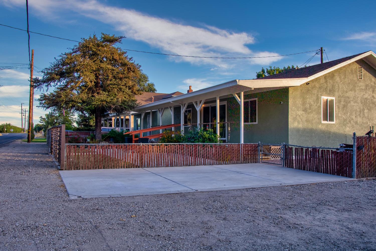 1639 Alpine Road Stockton, CA 95215 - Photo 9 of 96 a view of a house with a wooden fence