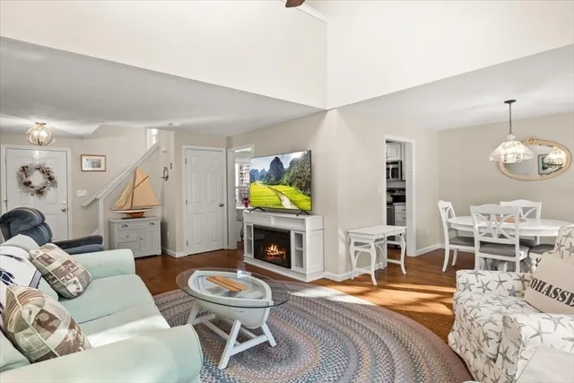 a bathroom with a granite countertop toilet a sink and mirror
