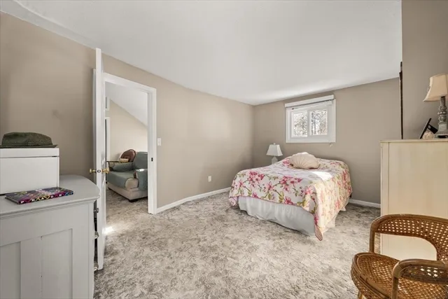 a view of a patio with a table and chairs