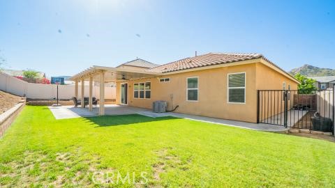20636 Spring Street Riverside, CA 92507 - Photo 5 of 9 a view of a house with swimming pool and porch