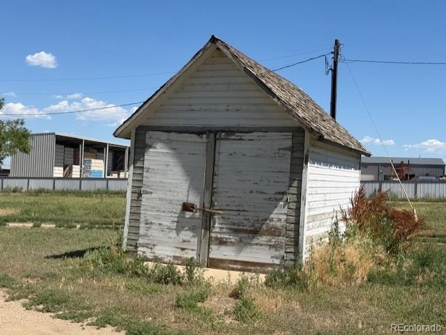 3608 Southeast Frontage Road Johnstown, CO 80534 - Photo 12 of 19 a front view of a house with garden