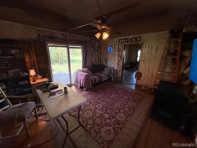 3608 Southeast Frontage Road Johnstown, CO 80534 - Photo 15 of 19 a view of a livingroom with furniture and window