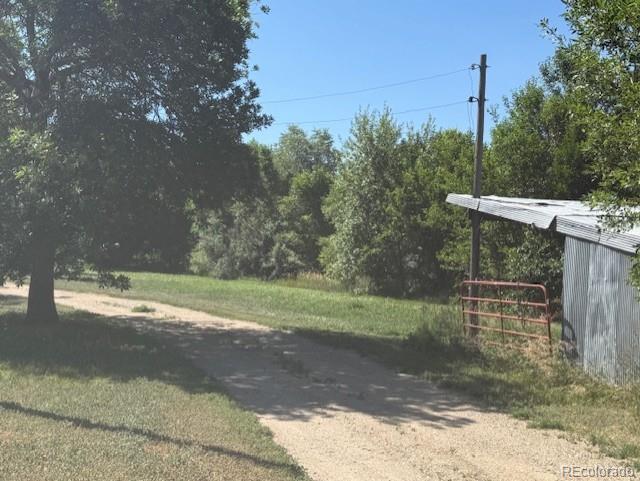 3608 Southeast Frontage Road Johnstown, CO 80534 - Photo 8 of 19 a view of a backyard