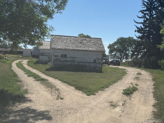 3608 Southeast Frontage Road Johnstown, CO 80534 - Photo 9 of 19 a view of a backyard