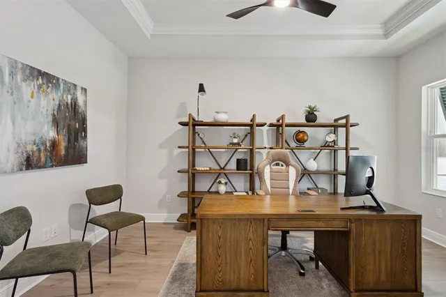 a view of a workspace with furniture