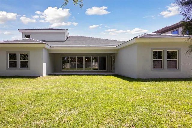 a view of a house with a swimming pool