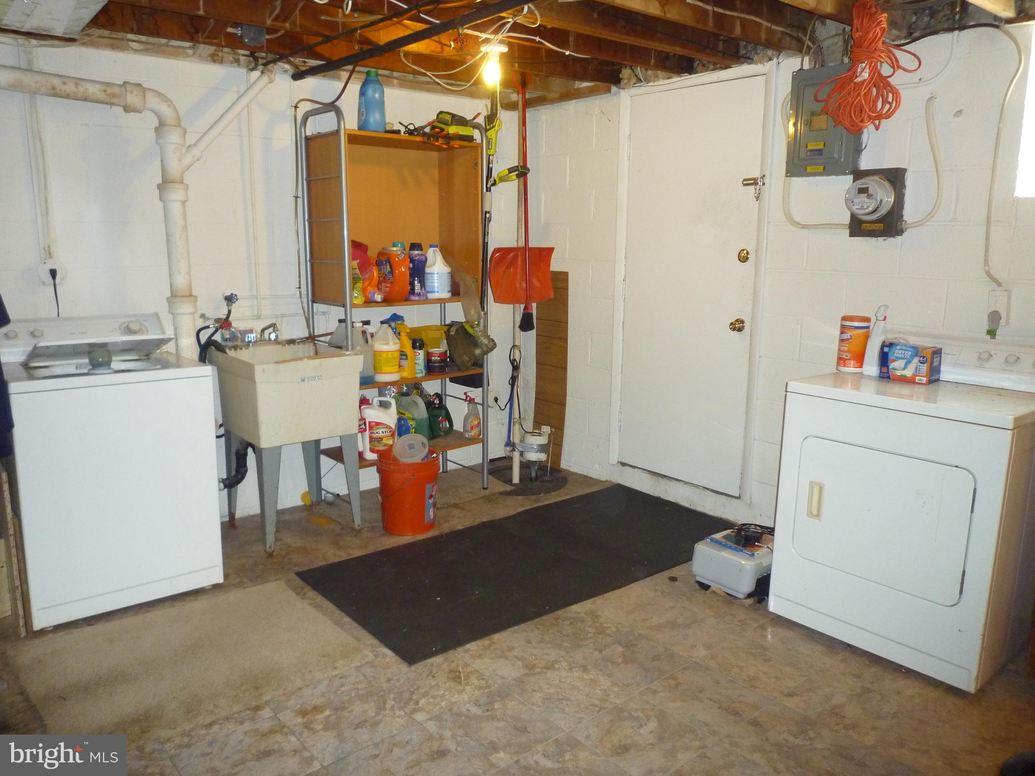 207 Southeastern Terrace Baltimore, MD 21221 - Photo 23 of 28 Basement w/Sump Pump