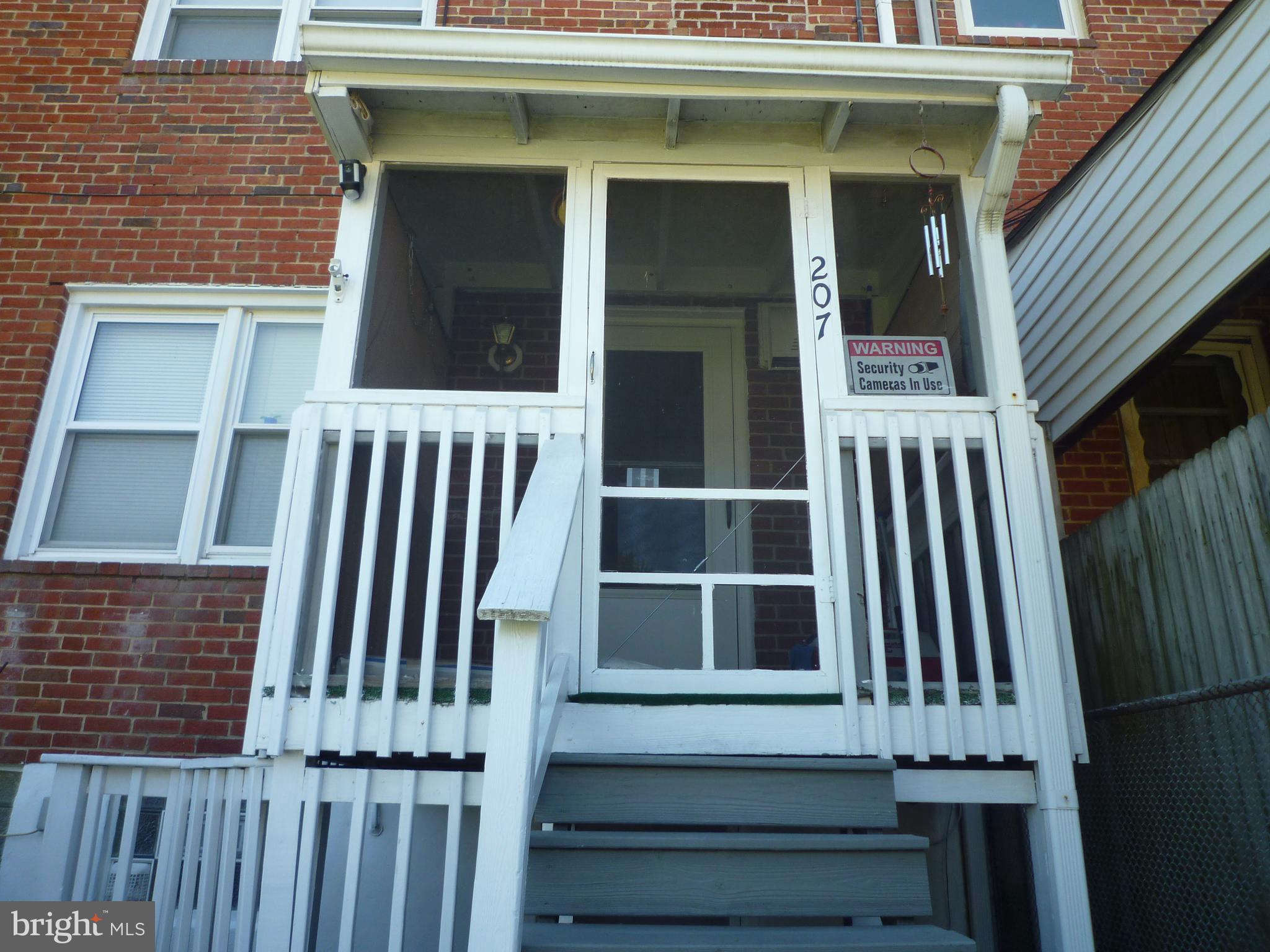 207 Southeastern Terrace Baltimore, MD 21221 - Photo 24 of 28 Enclosed Back Porch