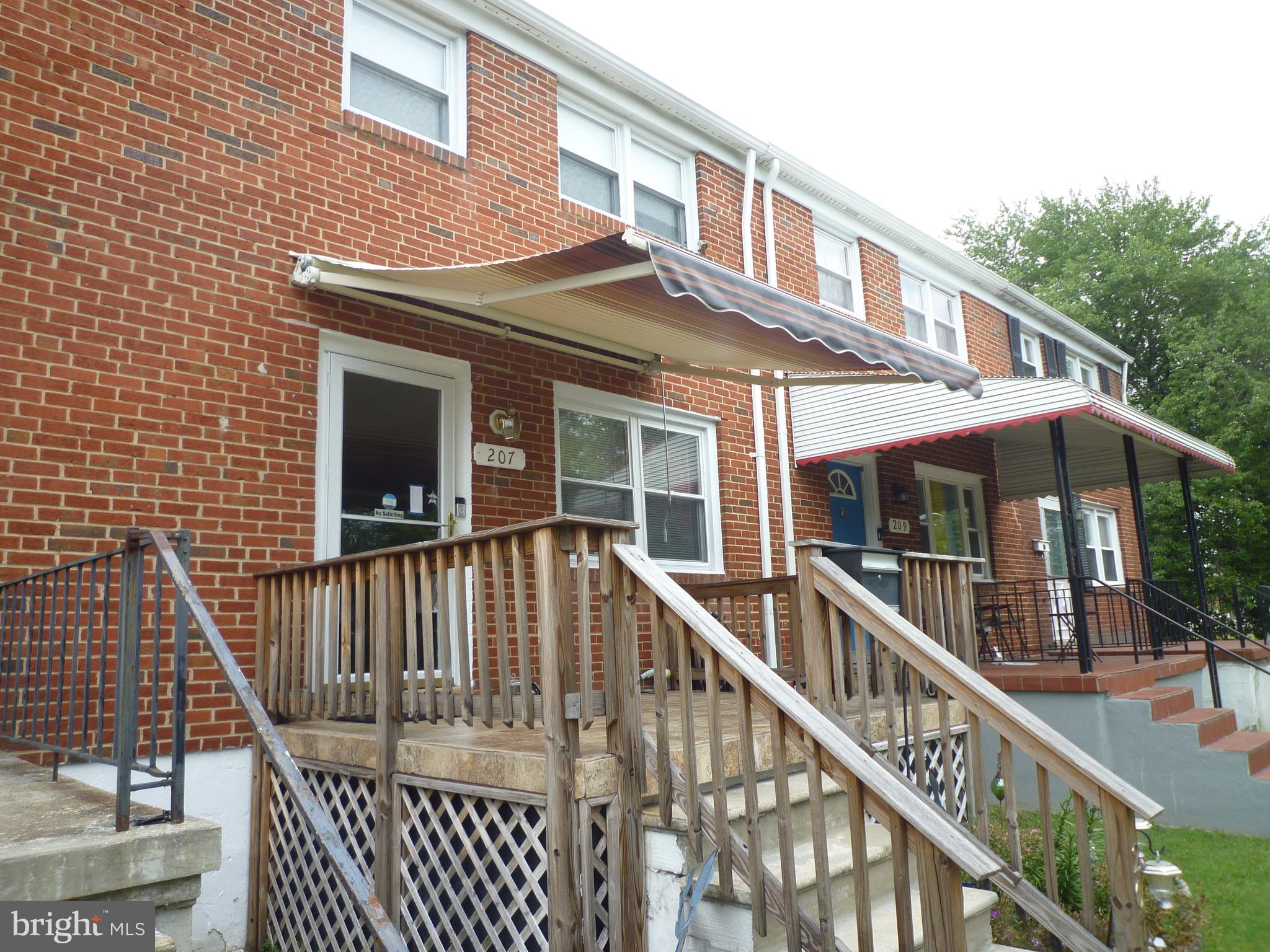 207 Southeastern Terrace Baltimore, MD 21221 - Photo 4 of 28 Sunsetter retractable awning w/replaceable