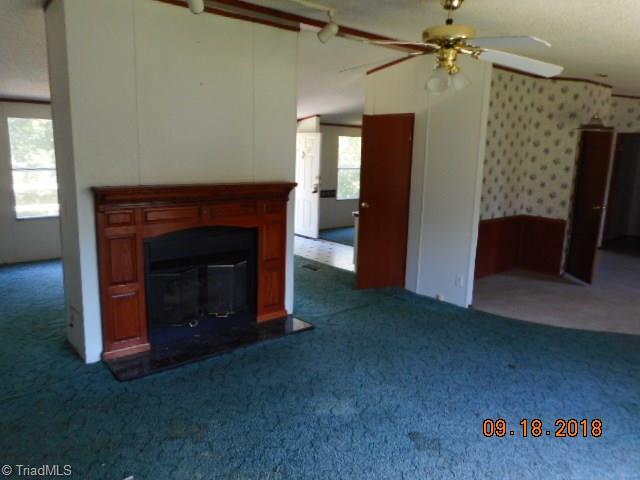 386 Michaels Road Mocksville, NC 27028 - Photo 5 of 17 Den w two side FP