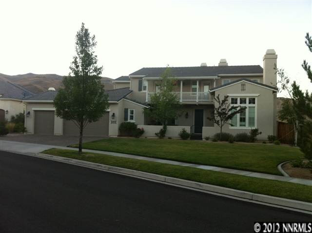 8355 Fairway Ridge Court Reno, NV 89523 - Photo 1 of 1 a front view of a house with a garden
