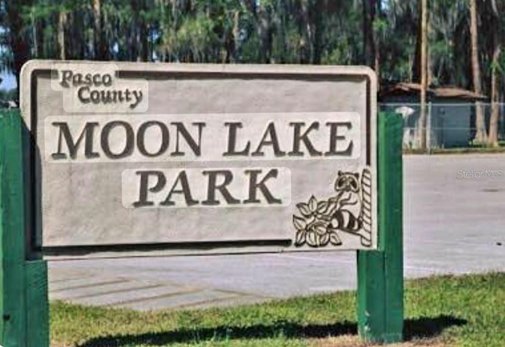 0 Ladd Avenue New Port Richey, FL 34654 - Photo 7 of 9 a view of outdoor space with sign board