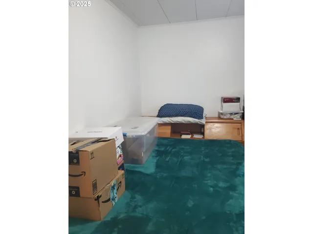 a utility room with sink and window