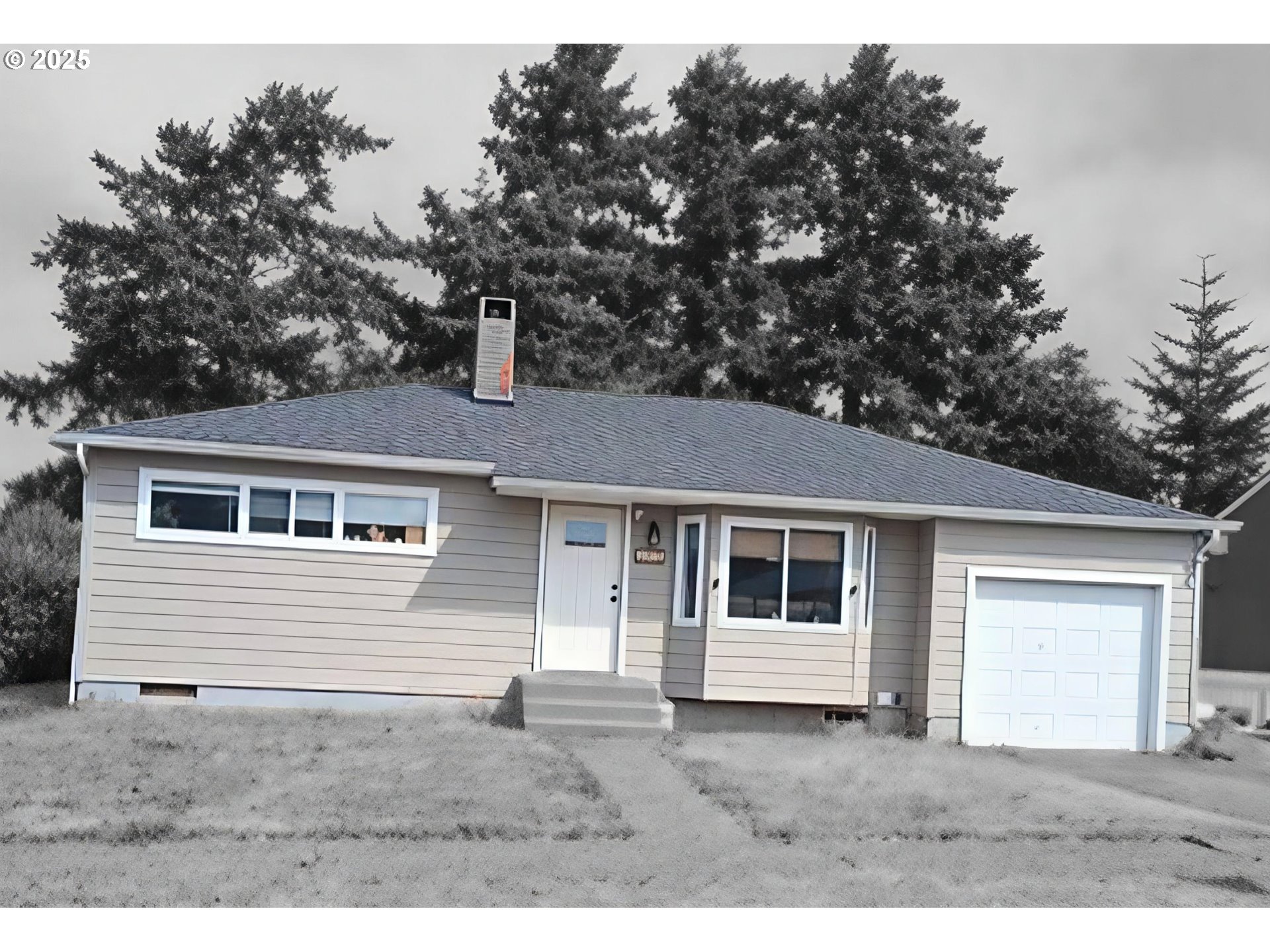 2075 Johnson Street North Bend, OR 97459 - Photo 18 of 20 a house that has a tree in front of the house