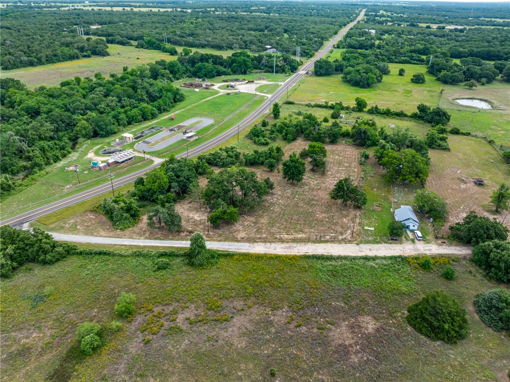 167 Signal Street Somerville, TX 77879 - Photo 12 of 12 a view of a garden with a lake