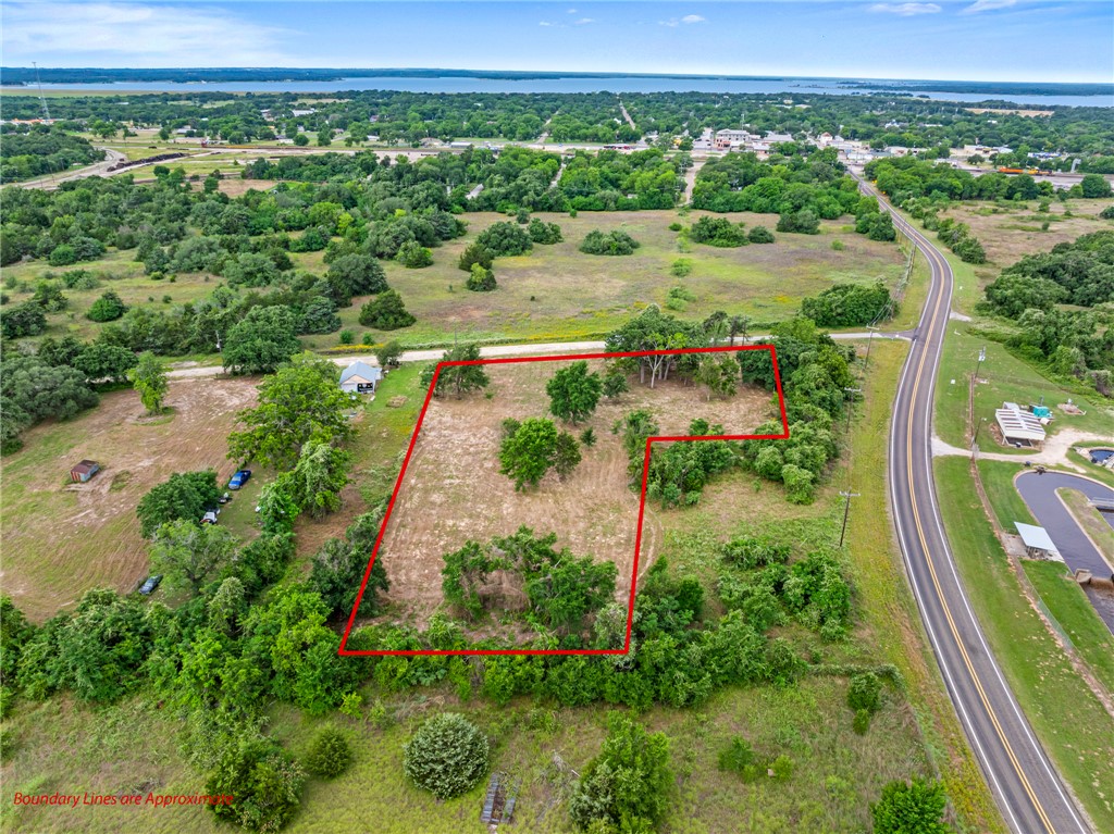 167 Signal Street Somerville, TX 77879 - Photo 6 of 12 a view of a lake with a mountain in the back