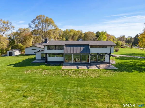 a view of a house with a big yard