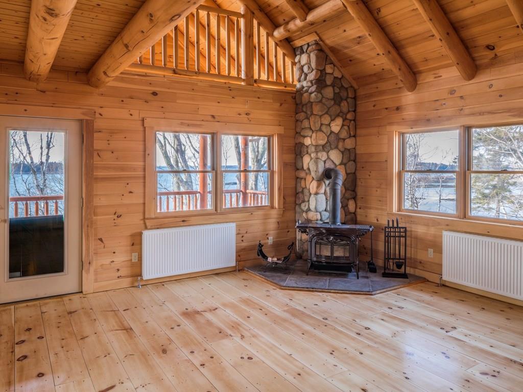 464 Basin Point Road Harpswell, ME 04079 - Photo 10 of 27 Great room with wood stove.