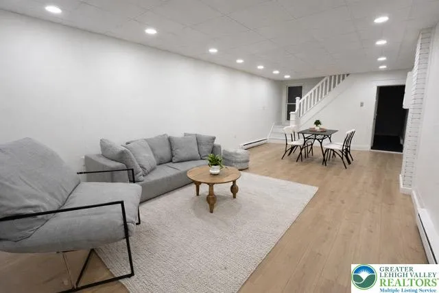 a living room with furniture and a couch