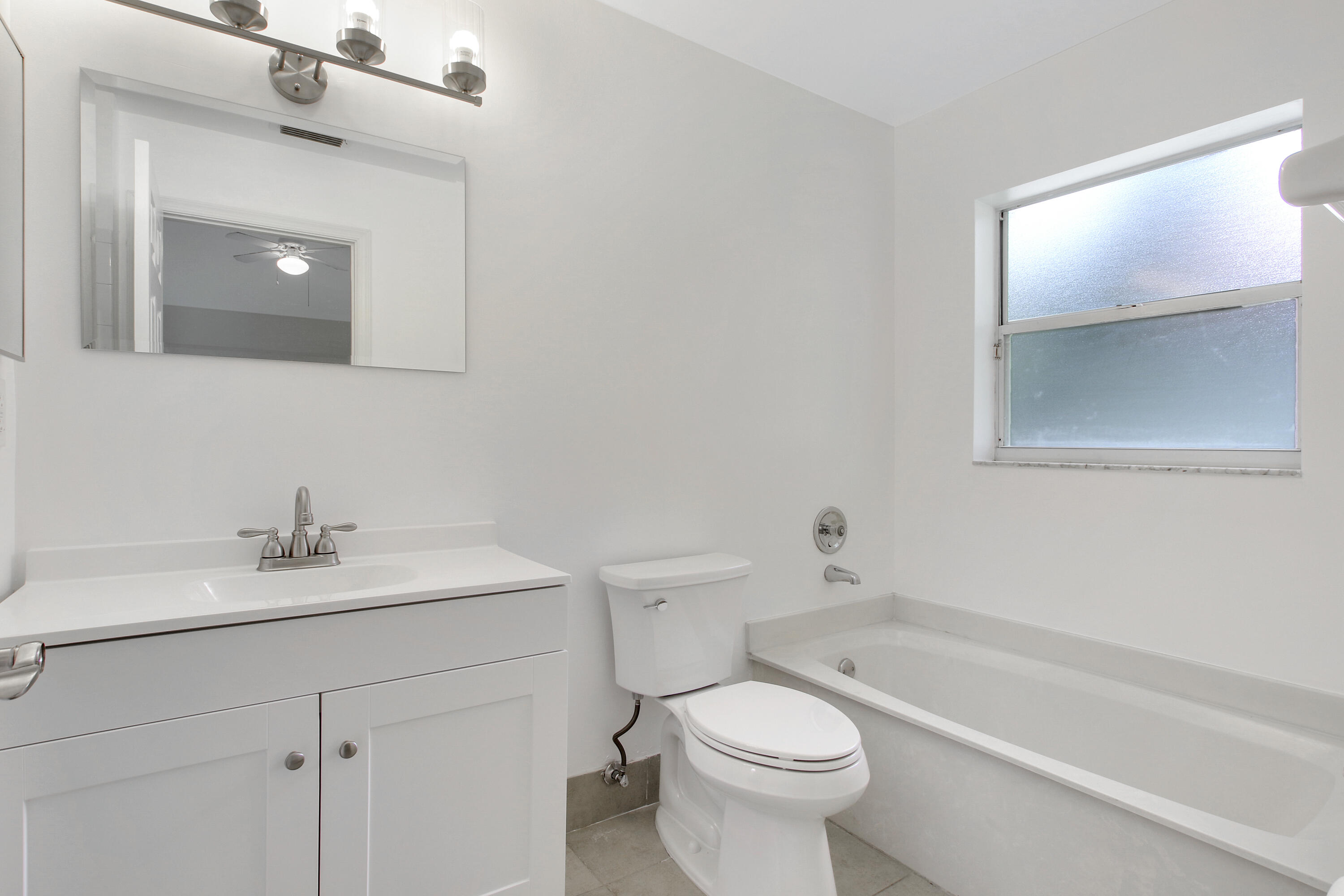 1009 Aspri Way Riviera Beach, FL 33418 - Photo 9 of 14 Primary bath