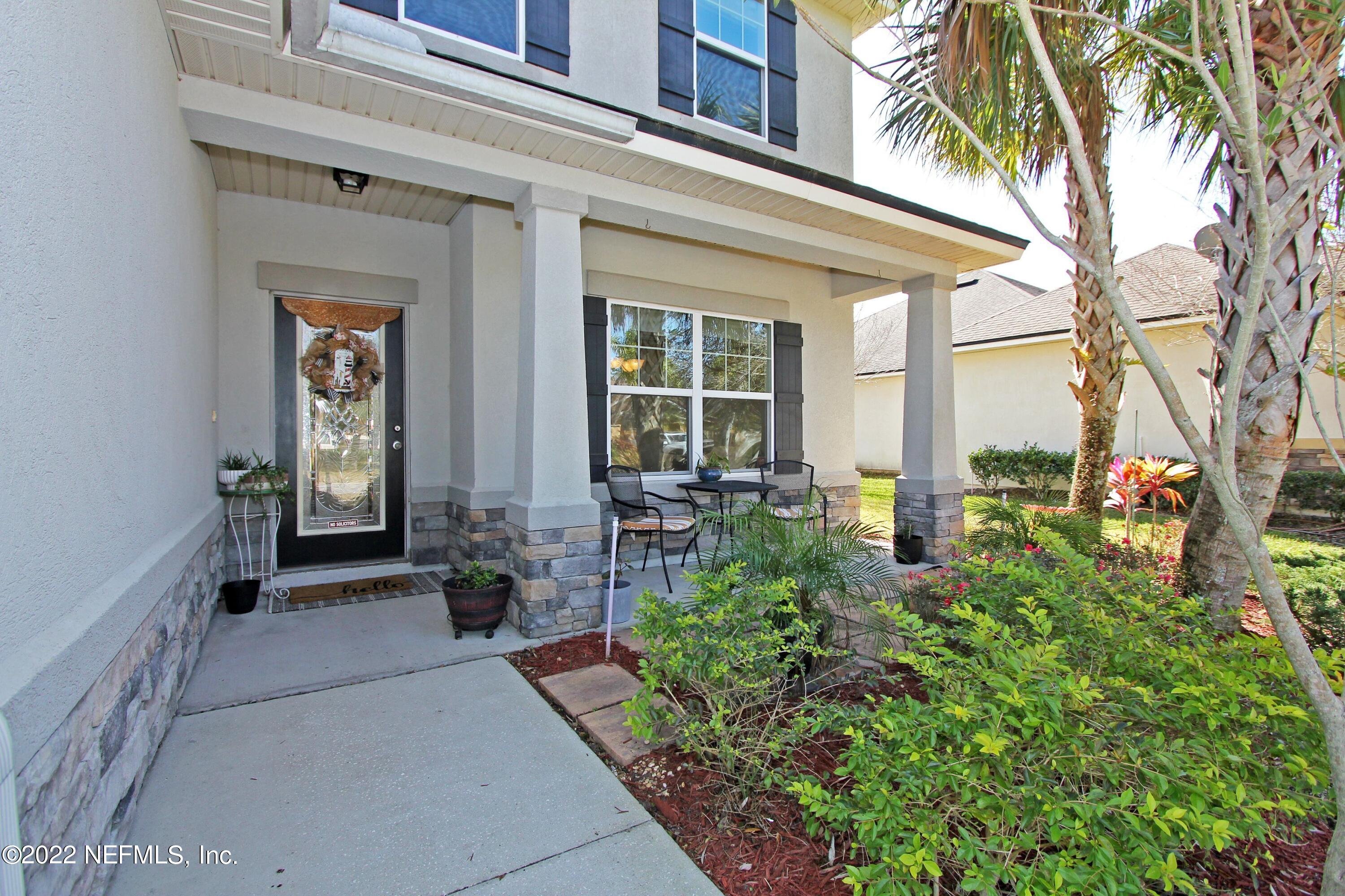 404 Paisley Place St. Johns, FL 32259 - Photo 2 of 42 a house view with a outdoor space