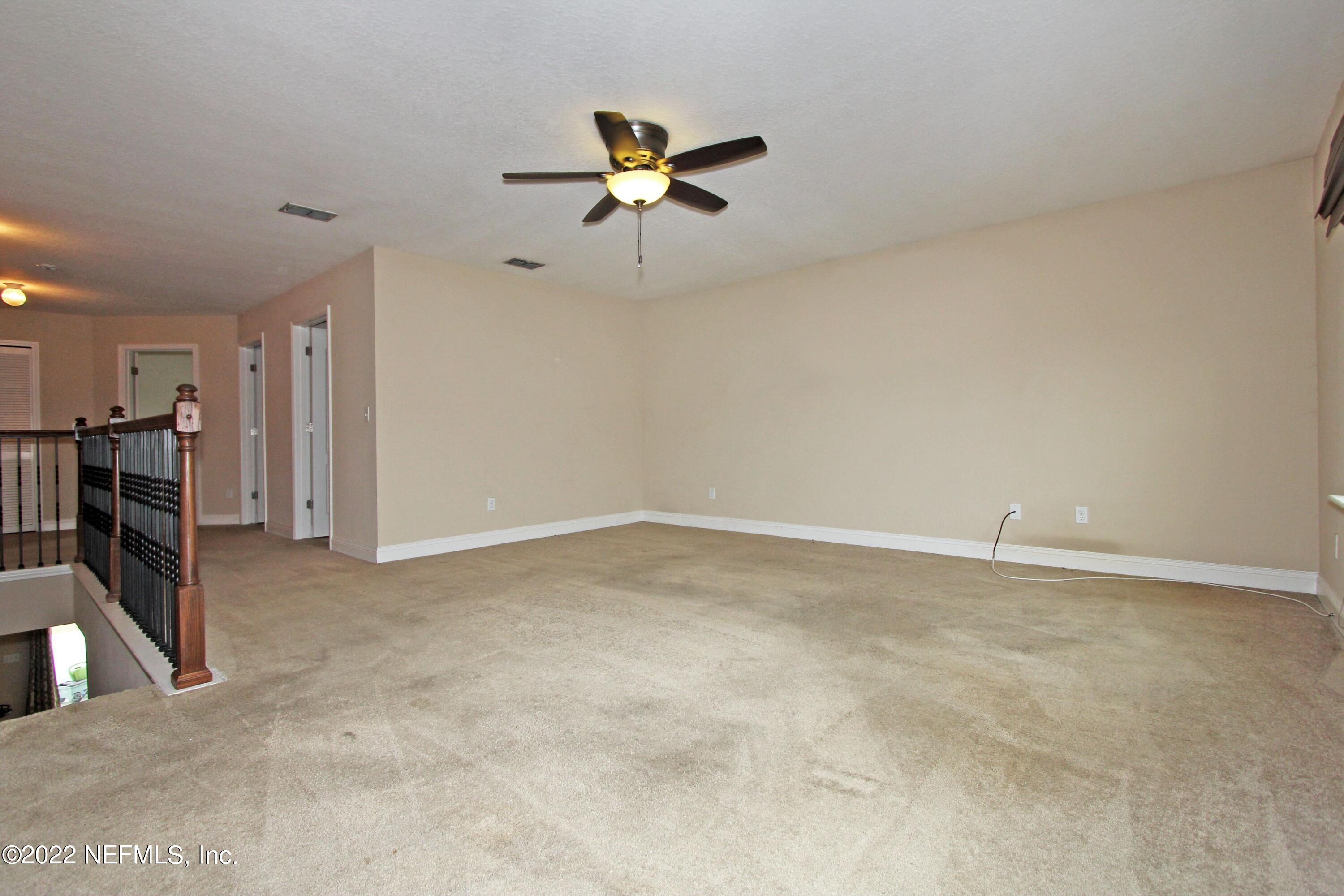 404 Paisley Place St. Johns, FL 32259 - Photo 27 of 42 a view of a livingroom with a furniture
