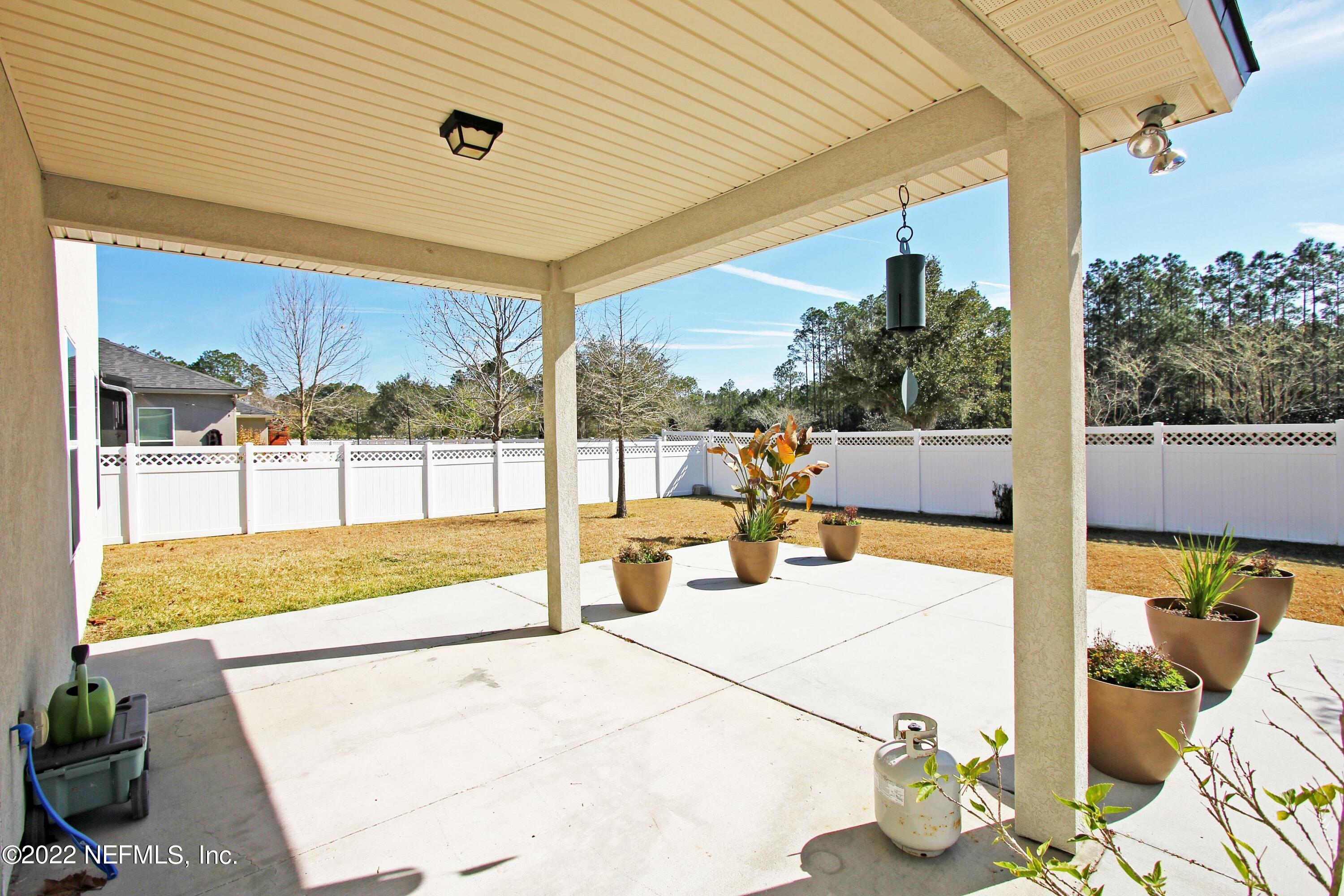 404 Paisley Place St. Johns, FL 32259 - Photo 37 of 42 a view of a swimming pool with a patio