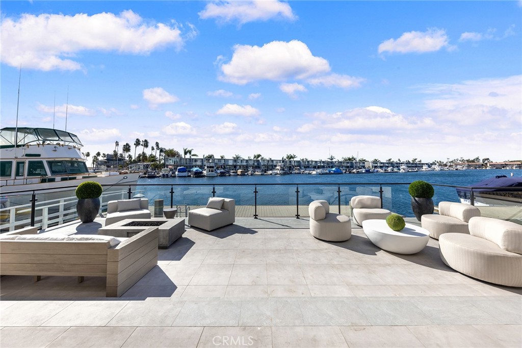 17007 Edgewater Lane Huntington Beach, CA 92649 - Photo 31 of 50 a outdoor space with patio furniture