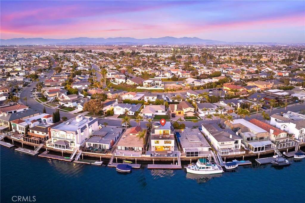 17007 Edgewater Lane Huntington Beach, CA 92649 - Photo 7 of 50 an aerial view of residential houses with city view