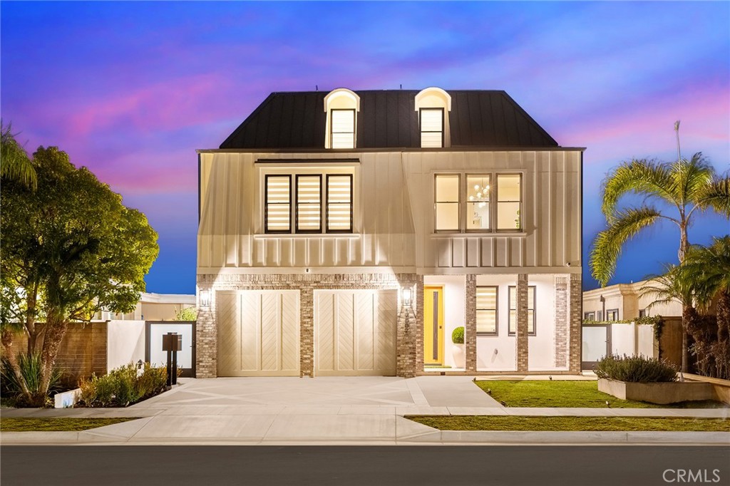 17007 Edgewater Lane Huntington Beach, CA 92649 - Photo 10 of 50 a front view of a house with a yard